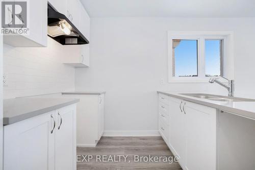 722 Mishi, Ottawa, ON - Indoor Photo Showing Kitchen With Double Sink