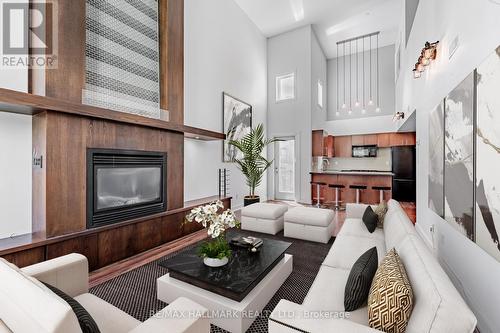 302 - 21 Earl Street, Toronto, ON - Indoor Photo Showing Living Room With Fireplace