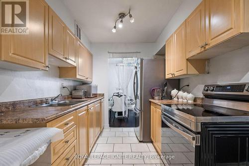 201 - 180 Markham Road, Toronto, ON - Indoor Photo Showing Kitchen With Double Sink