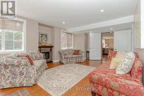 4 Champion Court, Brampton, ON - Indoor Photo Showing Living Room With Fireplace