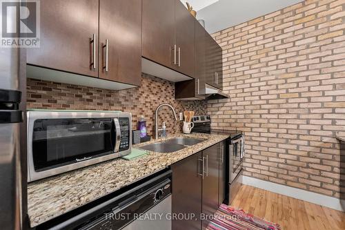 203 - 99 Chandos Avenue, Toronto, ON - Indoor Photo Showing Kitchen With Double Sink