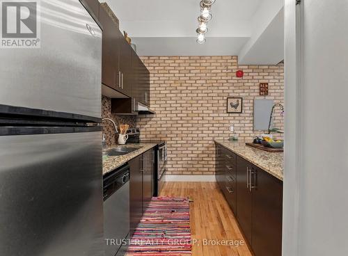 203 - 99 Chandos Avenue, Toronto, ON - Indoor Photo Showing Kitchen With Double Sink With Upgraded Kitchen