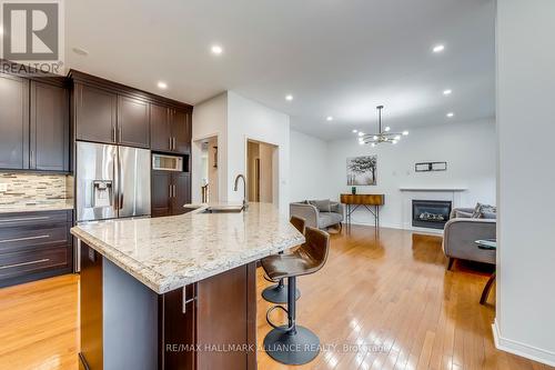 2183 Pheasant Lane, Oakville, ON - Indoor Photo Showing Kitchen With Fireplace With Upgraded Kitchen