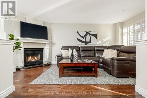 1594 Stillriver Crescent, Mississauga, ON - Indoor Photo Showing Living Room With Fireplace