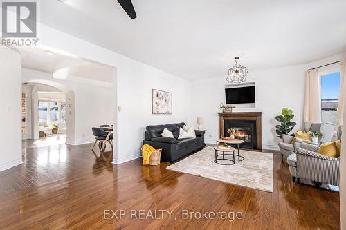 2174 Sunset Cove Circle, Ottawa, ON - Indoor Photo Showing Living Room With Fireplace