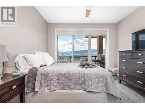 Primary bedroom, patio doors to deck - 3812 Terrapin Place, Vernon, BC - Indoor Photo Showing Bedroom