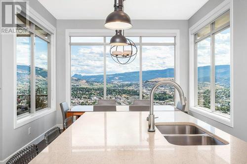 Expansive view from kitchen - 3812 Terrapin Place, Vernon, BC - Indoor Photo Showing Kitchen With Double Sink