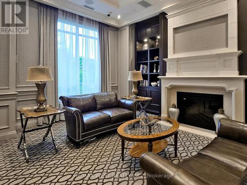 1716 - 9255 Jane Street, Vaughan, ON - Indoor Photo Showing Living Room With Fireplace