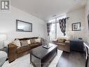 1716 - 9255 Jane Street, Vaughan, ON  - Indoor Photo Showing Living Room 