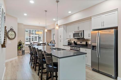 48-2490 Tuscany Drive, West Kelowna, BC - Indoor Photo Showing Kitchen With Stainless Steel Kitchen With Double Sink With Upgraded Kitchen