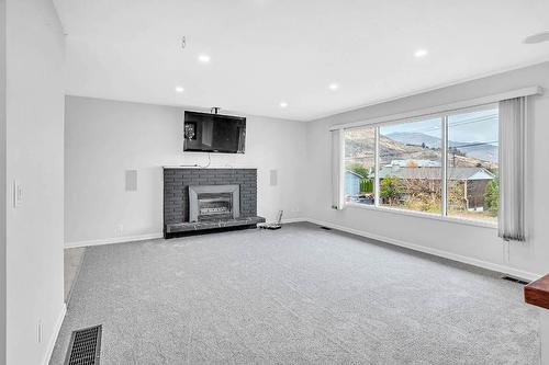 1074 Ollek Street, Kamloops, BC - Indoor Photo Showing Living Room With Fireplace