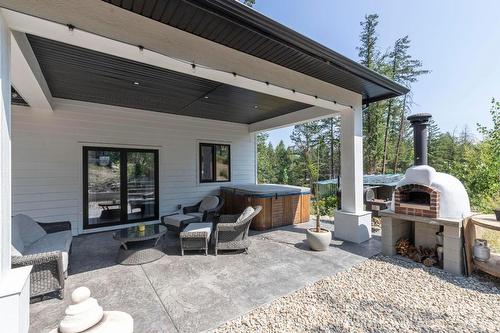 7864 Alpine Road, Kelowna, BC - Outdoor With Deck Patio Veranda With Exterior