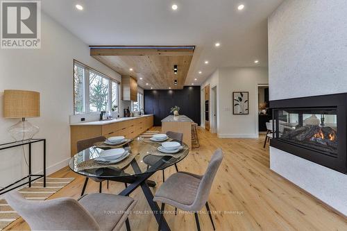 62 Melrose Drive, Niagara-On-The-Lake, ON - Indoor Photo Showing Dining Room With Fireplace