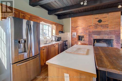 2555 County Road 38, Kingston (City North Of 401), ON - Indoor Photo Showing Kitchen With Fireplace