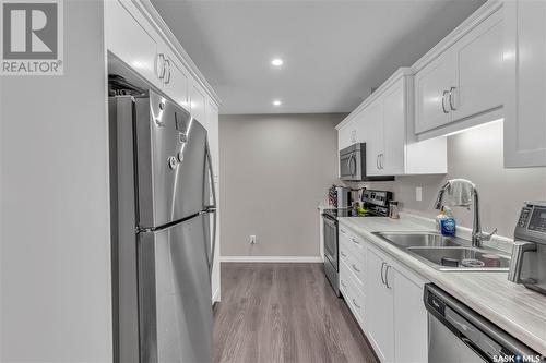 2101 104 Willis Crescent, Saskatoon, SK - Indoor Photo Showing Kitchen With Double Sink