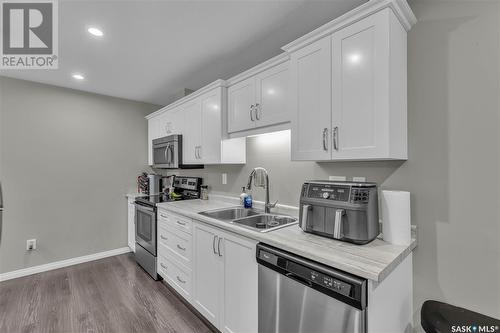 2101 104 Willis Crescent, Saskatoon, SK - Indoor Photo Showing Kitchen With Double Sink