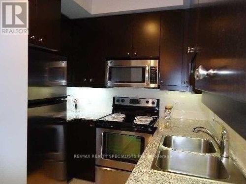 701 - 60 Absolute Avenue, Mississauga, ON - Indoor Photo Showing Kitchen With Stainless Steel Kitchen With Double Sink