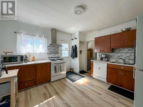 414 Marcella Street, Temiskaming Shores, ON - Indoor Photo Showing Kitchen With Double Sink