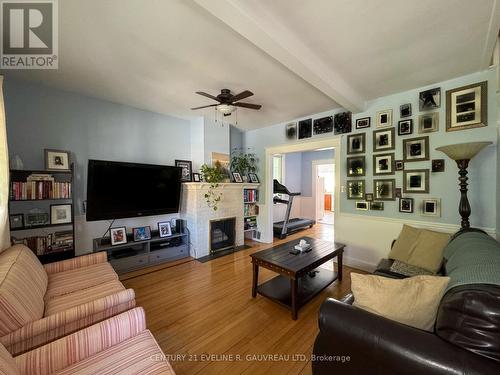 414 Marcella Street, Temiskaming Shores, ON - Indoor Photo Showing Living Room With Fireplace