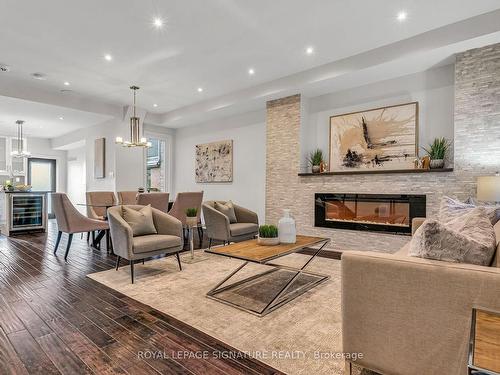 235 Bain Ave, Toronto, ON - Indoor Photo Showing Living Room With Fireplace