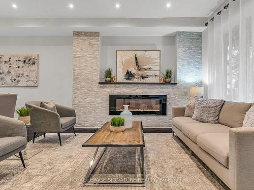 235 Bain Ave, Toronto, ON - Indoor Photo Showing Living Room With Fireplace