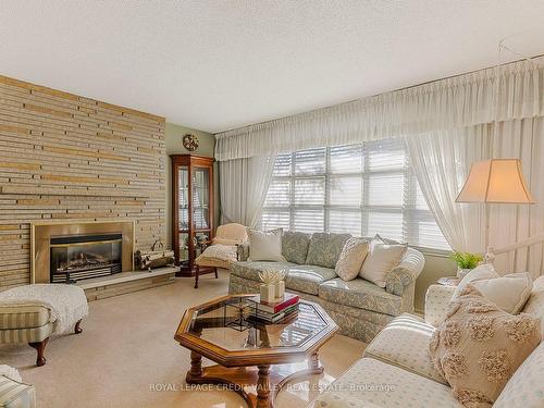 9 Norval Cres, Brampton, ON - Indoor Photo Showing Living Room With Fireplace