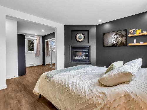 Master bedroom - 1150 Rue Dompierre, Mascouche, QC - Indoor Photo Showing Bedroom With Fireplace