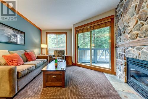 224C 2036 London Lane, Whistler, BC - Indoor Photo Showing Living Room With Fireplace