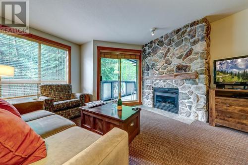 224C 2036 London Lane, Whistler, BC - Indoor Photo Showing Living Room With Fireplace