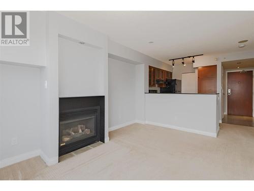 604 55 Alexander Street, Vancouver, BC - Indoor Photo Showing Living Room With Fireplace