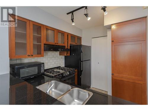 604 55 Alexander Street, Vancouver, BC - Indoor Photo Showing Kitchen With Double Sink