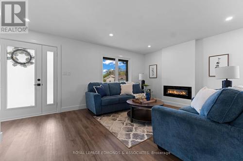 7 Mapleview Court E, Whitewater Region, ON - Indoor Photo Showing Living Room With Fireplace