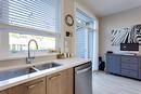 32-13098 Shoreline Way, Lake Country, BC  - Indoor Photo Showing Kitchen With Double Sink 