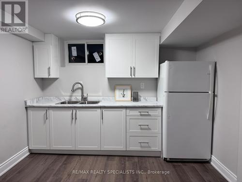 7010 Dunn Street, Niagara Falls, ON - Indoor Photo Showing Kitchen With Double Sink