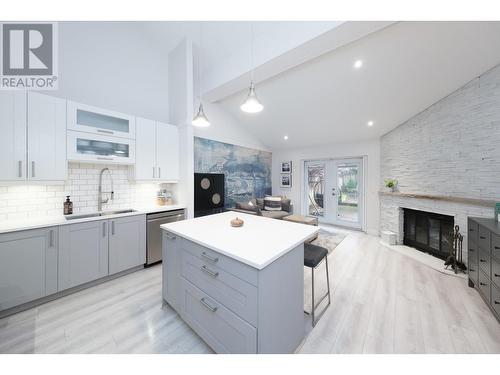 7180 Hecate Place, Vancouver, BC - Indoor Photo Showing Kitchen With Fireplace