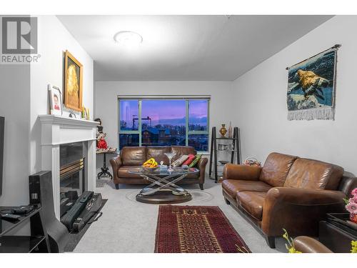 308 1085 W 17Th Street, North Vancouver, BC - Indoor Photo Showing Living Room With Fireplace