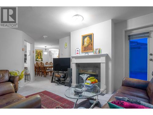 308 1085 W 17Th Street, North Vancouver, BC - Indoor Photo Showing Living Room With Fireplace