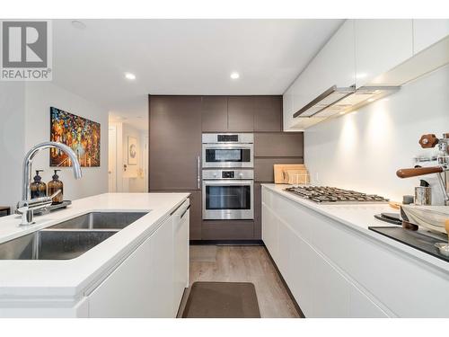 406 5508 Hollybridge Way, Richmond, BC - Indoor Photo Showing Kitchen With Stainless Steel Kitchen With Double Sink