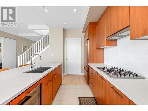 1502 9080 University Crescent, Burnaby, BC - Indoor Photo Showing Kitchen With Double Sink With Upgraded Kitchen