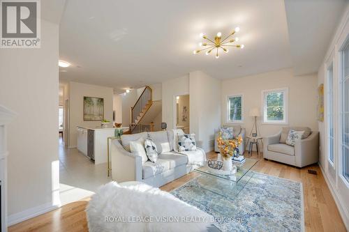 10 Coote Crt., Ajax, ON - Indoor Photo Showing Living Room With Fireplace