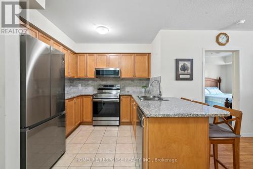 124 - 10 Mendelssohn Street, Toronto, ON - Indoor Photo Showing Kitchen With Double Sink