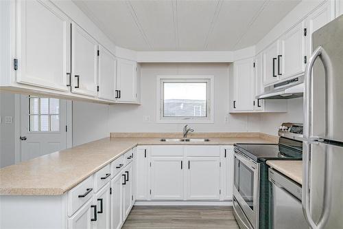 70 Sandale Drive, Winnipeg, MB - Indoor Photo Showing Kitchen With Double Sink