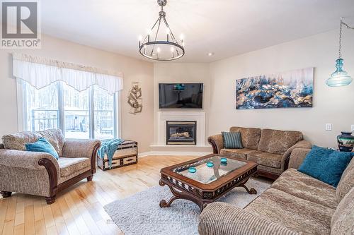 128 Wildwood Trail, Barrie, ON - Indoor Photo Showing Living Room With Fireplace