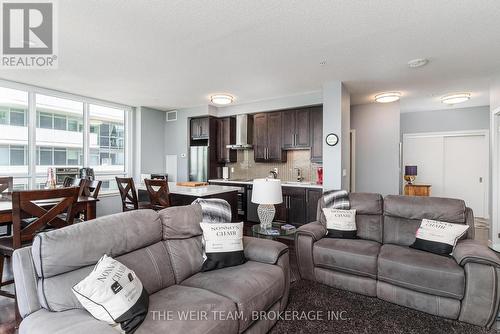 1201 - 2081 Fairview Street, Burlington, ON - Indoor Photo Showing Living Room