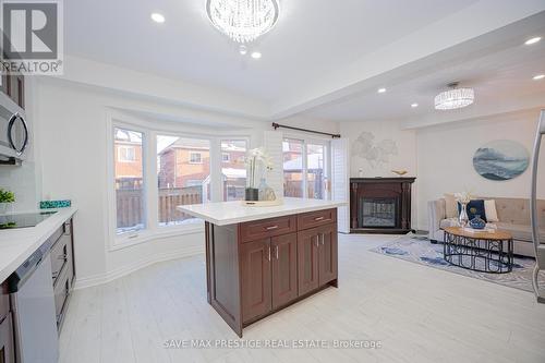 7 Hood Crescent, Brampton, ON - Indoor Photo Showing Other Room With Fireplace