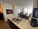 1410 - 4070 Confederation Parkway, Mississauga, ON  - Indoor With Fireplace 