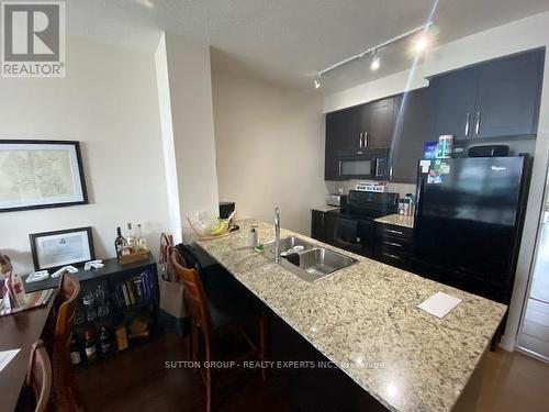 1410 - 4070 Confederation Parkway, Mississauga, ON - Indoor Photo Showing Kitchen With Double Sink