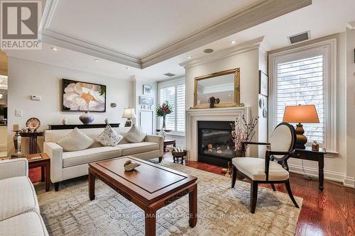 201 - 111 Forsythe Street, Oakville, ON - Indoor Photo Showing Living Room With Fireplace