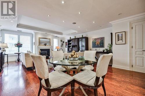 201 - 111 Forsythe Street, Oakville, ON - Indoor Photo Showing Dining Room With Fireplace