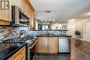 25 Thicketwood Avenue, Barrie, ON  - Indoor Photo Showing Kitchen With Fireplace With Double Sink With Upgraded Kitchen 